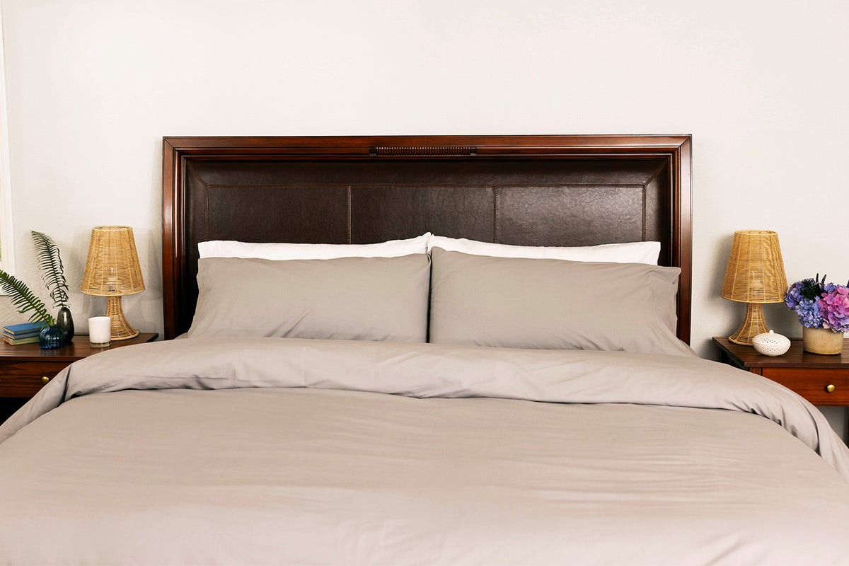 Bed made with Carolina Gray Heritage American Sheets.