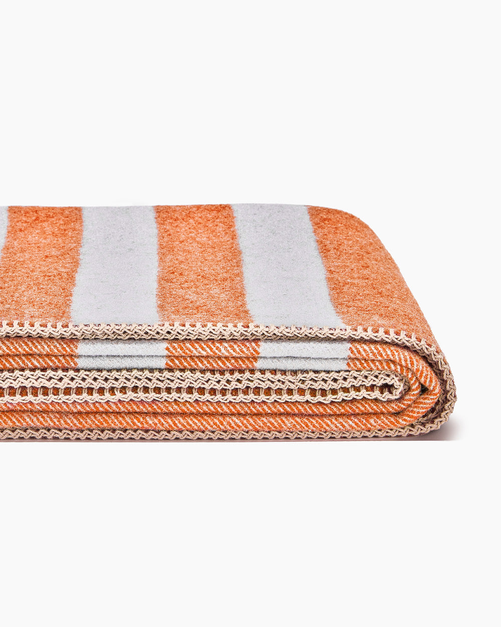 Folded Northwest Wool Throw (in the color Mesa Sunset).