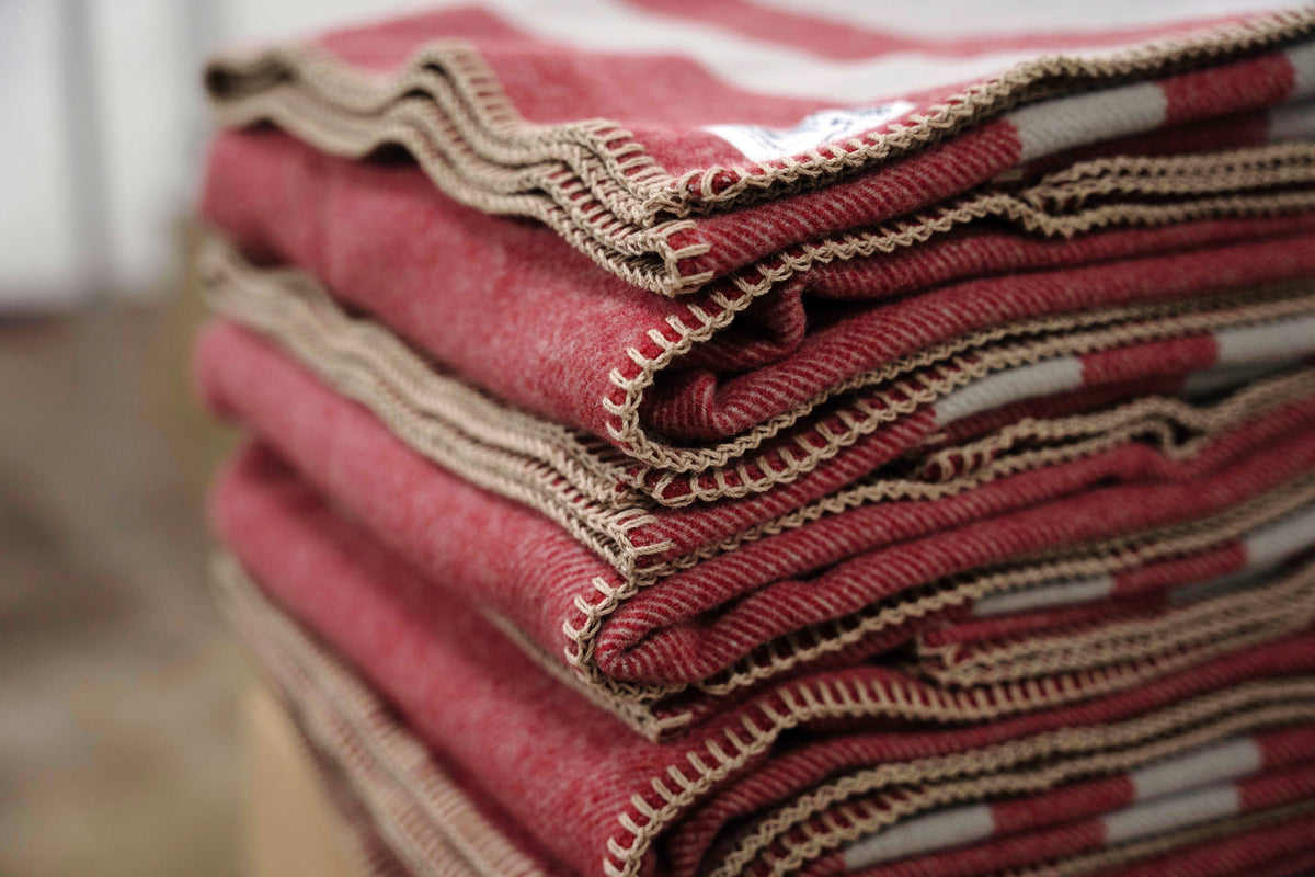 Stack of folded Northwest Wool Throws.
