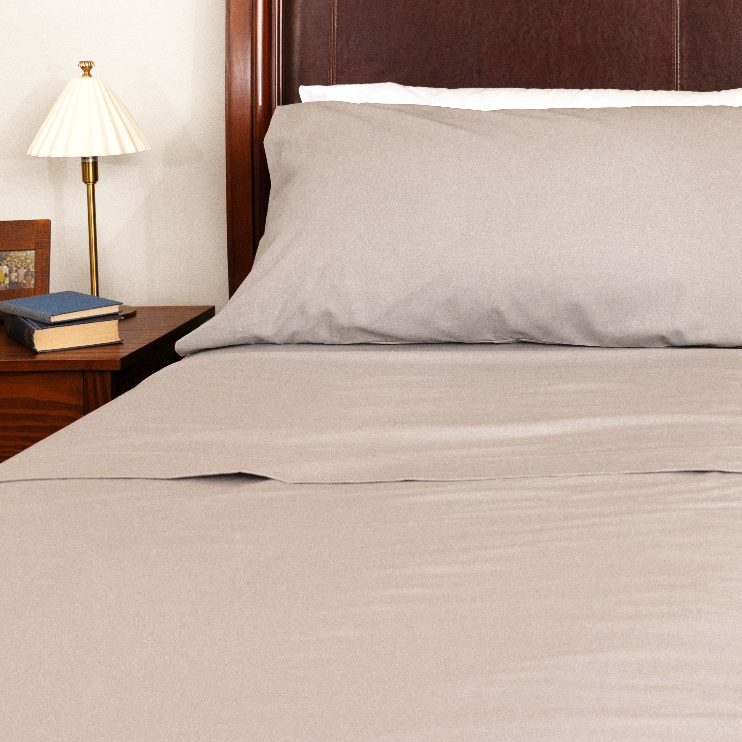 Bed made with Carolina Gray Heritage American Sheets.