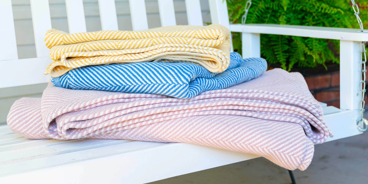 blankets stacked on front porch