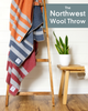 Meet the two new colors of our limited-edition Northwest Wool Throw! Expertly woven by the iconic Pendleton Woolen Mills® in Washington. Mesa Sunset is the perfect shade to welcome the glowing warmth of autumn. Ideal for cozing up by the fire and snuggling with the family. Or choose Denim Blue: a timeless American classic you'll reach for every day. Finely crafted Sheep-to-Stitch™ in the USA from Oregon wool. This stylish heirloom is built to be treasured and enjoyed for decades.